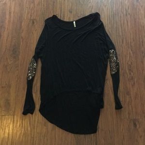 Lightweight black tunic with gold glitter elbows